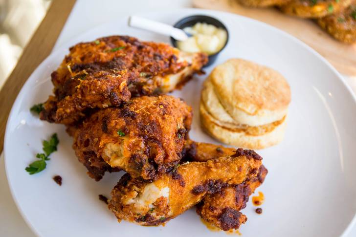 Nashville Stye Hot Chicken ($34 for half bird, pictured, served with two sides)<br/>